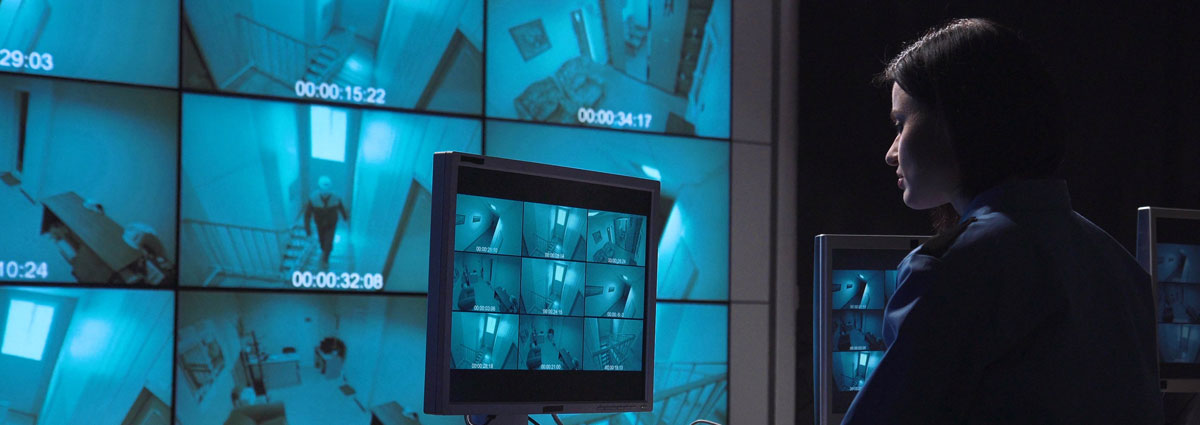 Correctional institute security monitoring guard with video wall